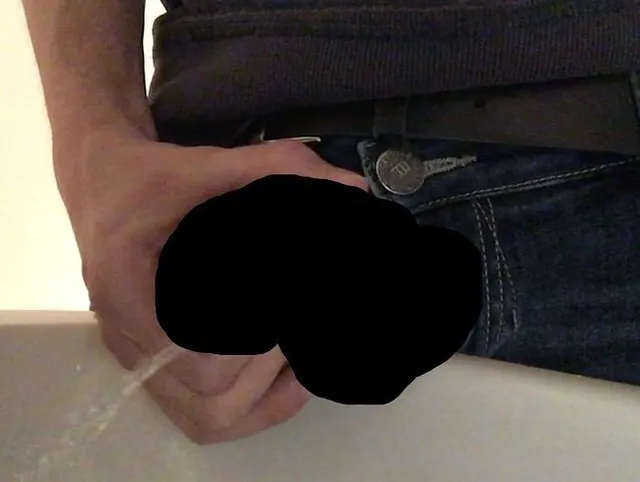 Fetish gay boy is pissing - close up